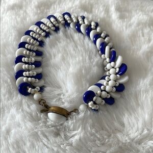 Blue and White Beaded Bracelet with Unique Pattern and Metal Clasp 
West Germany